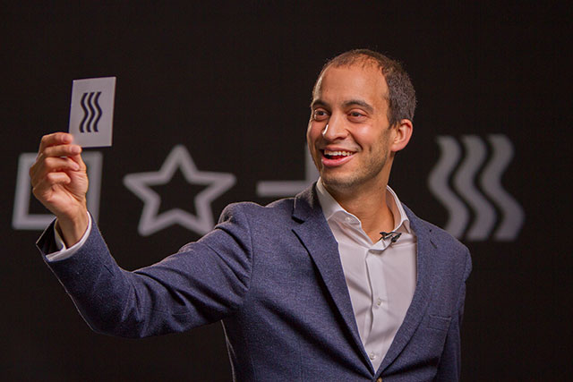 David Narayan holding ESP symbol